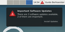 Screenshot of package-update-indicator desktop notification and indicator notifying about available package updates